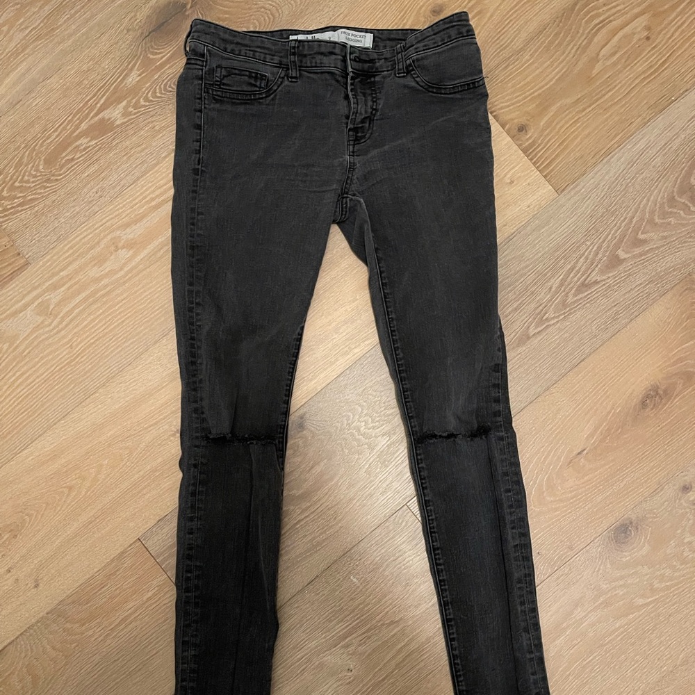 Black Charlotte Russe jeans with two knee slits. Great condition.